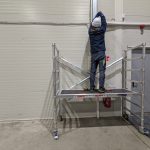 worker on SNAPPY foldable scaffolding tower